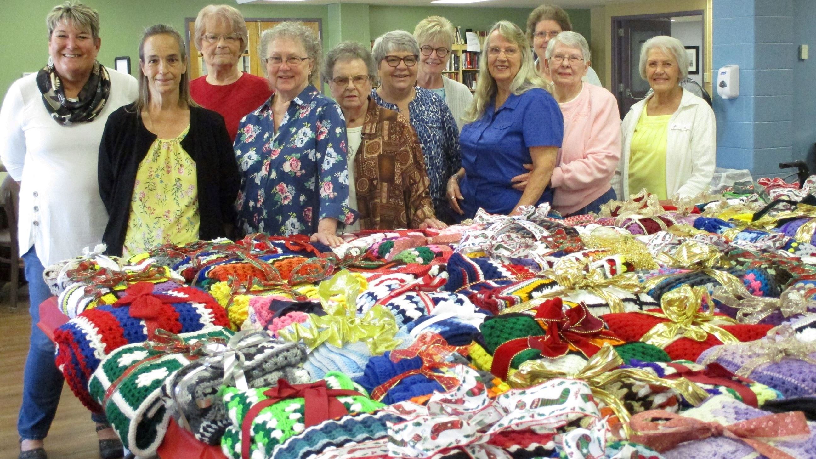 photo of the Granny Square Group with their blankets